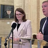 Stormont Finance Minister Caoimhe Archibald (left) with Irish Minister of Finance Michael McGrath speaking to media in the Great Hall at Parliament Buildings, Stormont, following an Irish government funding announcement for a number of projects, including the proposed upgrade of the A5 and rebuilding of Casement Park