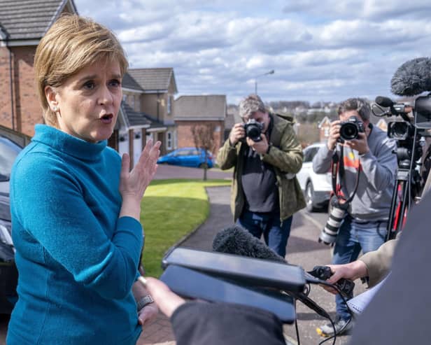 Ex SNP leader  Nicola Sturgeon speaking to the media outside her home in Glasgow, after her husband,  ex SNP chief executive Peter Murrell, was "released without charge pending further investigation", after he was arrested on Wednesday as part of a probe into the party's finances. On Nicola becoming leader her husband should have quit running the party. Photo. Jane Barlow/PA Wire