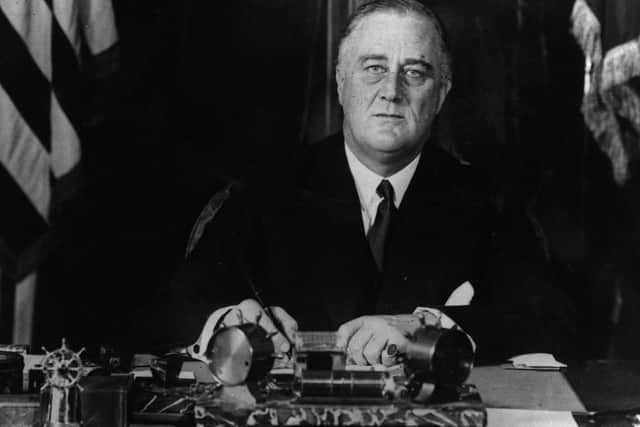 circa 1940:  American President Franklin Delano Roosevelt (1882 - 1945) at his desk.  (Photo by Hulton Archive/Getty Images)