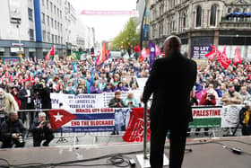 General secretary of the Rail, Maritime and Transport union (RMT) Mick Lynch addresses the crowd at the May Day trade union rally in Belfast.