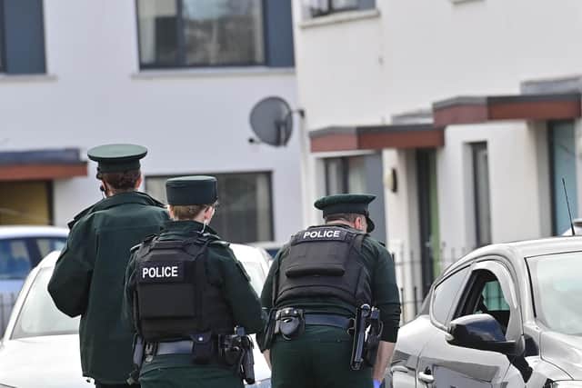 Police sealed off the Weavers grange area of Newtownards on Thursday after masked men were seen on the streets