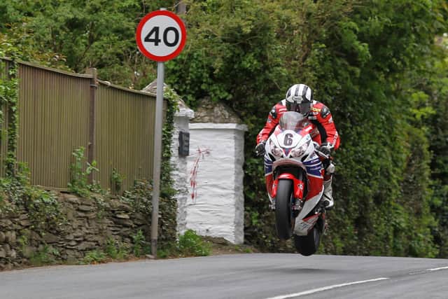 Michael Dunlop at Ballacrye jump on his way to victory in the 2013 Superbike TT on the Honda Legends Fireblade