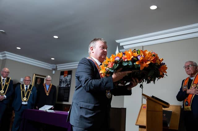Orange Grand Master Harold Henning lays a wreath in memory of the 344 murdered members, at Schomberg House in east Belfast today