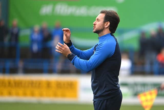 Glenavon manager Stephen McDonnell has completed his first signing as Lurgan Blues boss