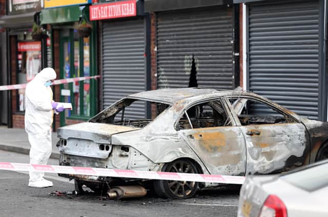 The scene at Pizza Guys on the Andersontown Road, west Belfast. Photo: Jonathan Porter/PressEye