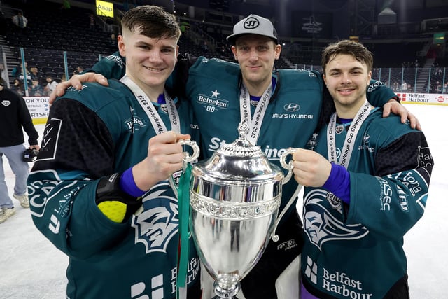 Local Belfast Giants Kell Beattie, Andrew Dickson and Mack Stewart celebrate after defeating the Fife Flyers to win the Challenge Cup Final at the SSE Arena, Belfast.  Photo by William Cherry/Presseye