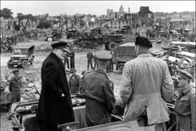 (From left) British Prime minister Winston Churchill, Sir Miles Dempsey, British 2nd Army commandant, and British general Marshal Bernard Montgomery visit destroyed city of Caen, 23 July 1944 after Allied forces stormed the Normandy beaches on D-Day. D-Day, 06 June 1944 is still one of the world's most gut-wrenching and consequential battles, as the Allied landing in Normandy led to the liberation of France which marked the turning point in the Western theater of World War II.        (Photo credit should read STF/AFP/Getty Images)