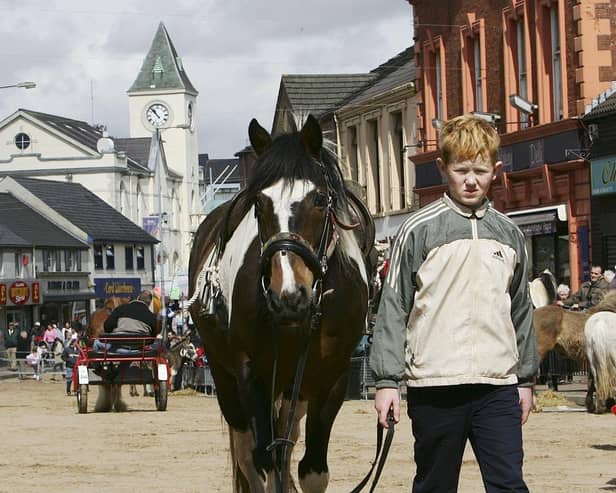 John Ryan takes his horse for a walk during the traditional Ballyclare May Festival and Horse Fair in May 2006. Picture: News Letter archives/Gavan Caldwell