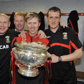 Scott Young (second from right) with Pete Batey (right), Tim McCann (left) and Davy McClelland after Glentoran won the League Cup in March 2010. (Photo by Russell Pritchard/Presseye)