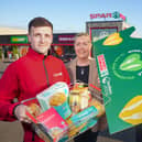 FareShare Partnership 1: Ian Hamill from SPAR Mallusk, Bronagh Luke from Henderson Group and Declan McKillop from FareShare Northern Ireland launch SPAR’s One Million Meals project in Northern Ireland, which will see £250K – the equivalent of one million meals – donated to the charity.