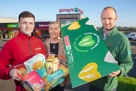 FareShare Partnership 1: Ian Hamill from SPAR Mallusk, Bronagh Luke from Henderson Group and Declan McKillop from FareShare Northern Ireland launch SPAR’s One Million Meals project in Northern Ireland, which will see £250K – the equivalent of one million meals – donated to the charity.