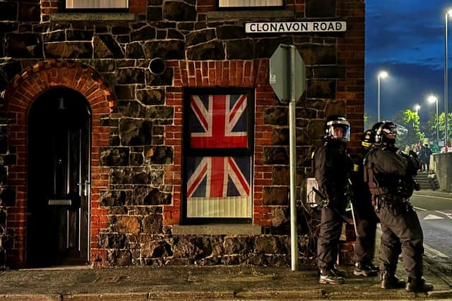 Police officers on Clonavon Road in Ballymena during the second night of violence in Ballymena in June 2025. Photo: Liam McBurney/PA Wire