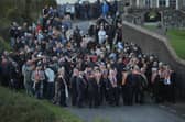 Loyalist supporters and orange men face the police outside Drumcree Church, where they have formed a barricade to prevent them entering the Garvaghy Road. Members of the Orange Order were due to take part in the first return parade on the road for almost 30 years. Picture date: Sunday September 27, 2026. PA Photo. Photo credit should read: Peter Morrison/PA Wire