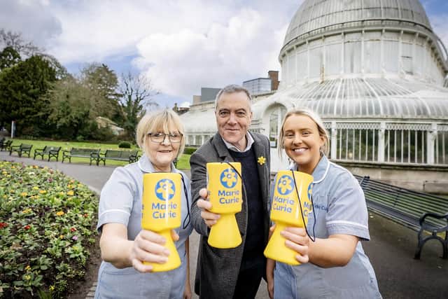 James Nesbitt with Marie Curie community nurse Joan Wilson (left) and hospice nurse Emily Jackson as the charity launched its annual fundraising appeal in Belfast.