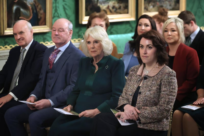 Queen Camilla (centre) attends an event hosted by the Queen's Reading Room to mark World Poetry Day at Hillsborough Castle in Belfast