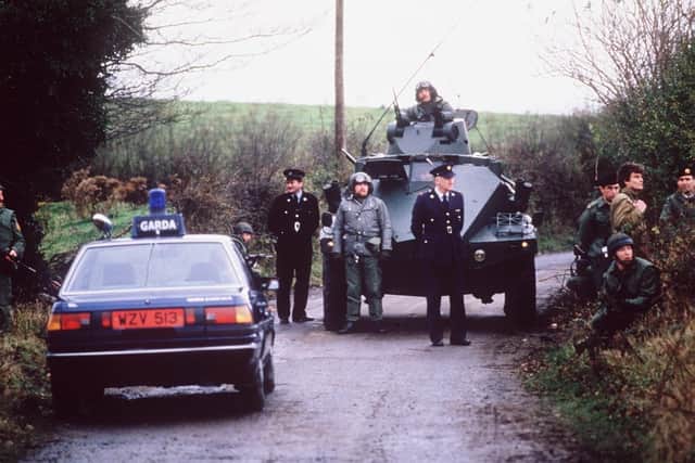 Irish army and Irish police at a border checkpoing in the late 1980s
