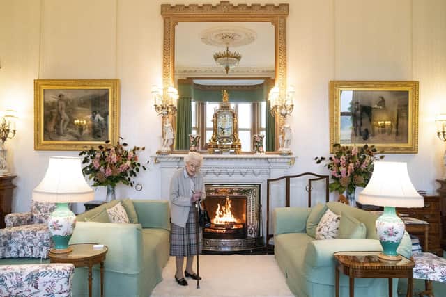 Queen Elizabeth II waits in the Drawing Room before receiving newly elected leader of the Conservative party Liz Truss at Balmoral Castle. (Photo by Jane Barlow - WPA Pool/Getty Images)