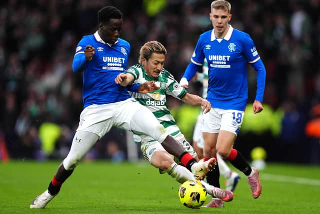 Rangers' Djeidi Gassama (left) battling with Daizen Maeda during the Premier Sports Cup semi-final loss to Celtic on Sunday at Hampden Park. (Photo by Andrew Milligan/PA Wire)