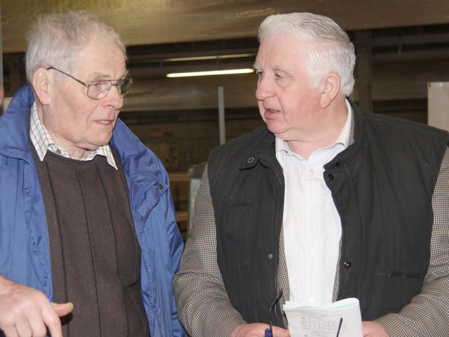 Simmental breeders Billy Robson OBE, Doagh, and Cecil McIlwaine, Newtownstewart, at the club's Dungannon show and sale. Picture: Julie Hazelton