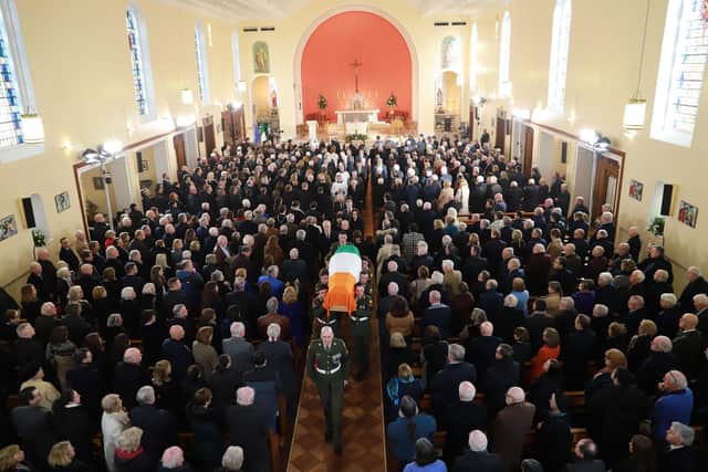 The coffin of former taoiseach John Bruton being carried during his state funeral service at Saints Peter and Paul's Church in Dunboyne, Co Meath. Photo: Julien Behal/Government Information Service/PA Wire