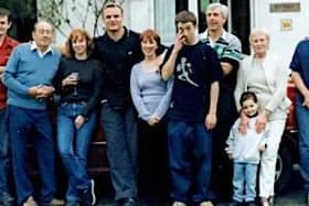 Scott Robertson (fourth from left) - the new All Blacks head coach - with the Heron family during his time in Ards