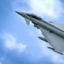 Two RAF Typhoon jet fighters shook homes over greater Belfast area while intercepting a suspicious aircraft.