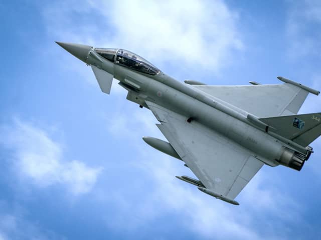 Two RAF Typhoon jet fighters shook homes over greater Belfast area while intercepting a suspicious aircraft.