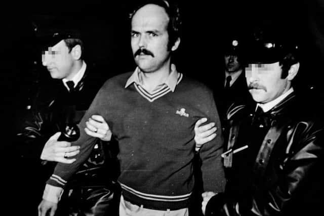Following a shoot-out with Gardai, RUC members take custody of Dominic McGlinchey who was handed over to the RUC by members of the Gardai at the border near  Carrickdale outside Dundalk, circa March 1984
