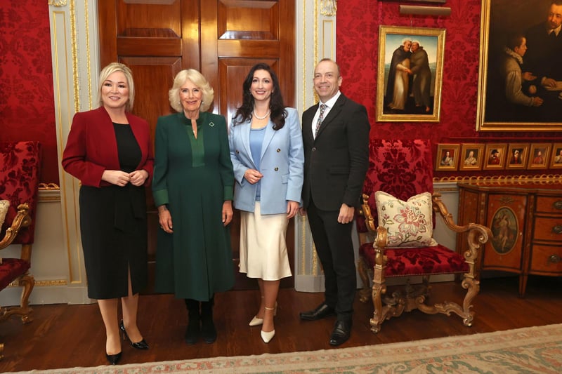 Queen Camilla (2nd left) with First Minister Michelle O'Neill (left), Deputy First Minister Emma Little-Pengelly (2nd right) and Northern Ireland Secretary Chris Heaton-Harris (right) as she attends an event hosted by the Queen's Reading Room to mark World Poetry Day at Hillsborough Castle in Belfast, during her two-day official visit to Northern Ireland.