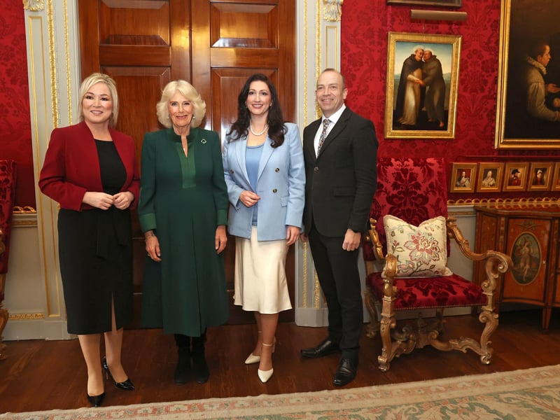 Queen Camilla (2nd left) with First Minister Michelle O'Neill (left), Deputy First Minister Emma Little-Pengelly (2nd right) and Northern Ireland Secretary Chris Heaton-Harris (right) as she attends an event hosted by the Queen's Reading Room to mark World Poetry Day at Hillsborough Castle in Belfast, during her two-day official visit to Northern Ireland.