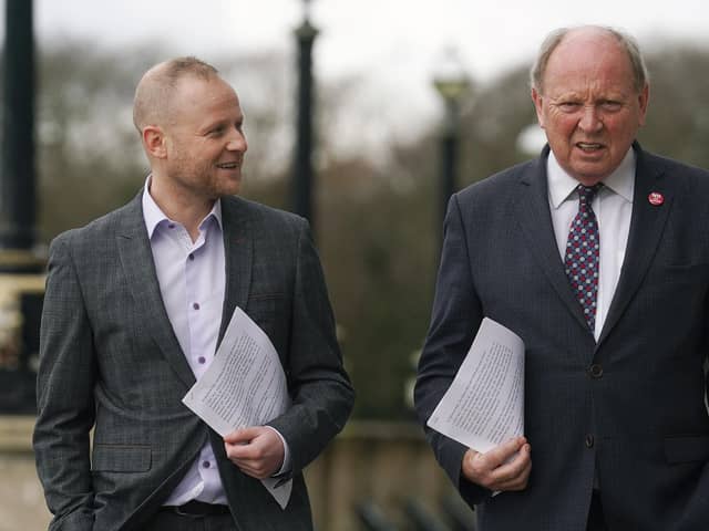 Loyalist activist Jamie Bryson (left) and TUV leader Jim Allister on the steps of Stormont. The pair will address a public meeting together next week about the DUP deal with government on the NI Protocol. Photo: Brian Lawless/PA Wire