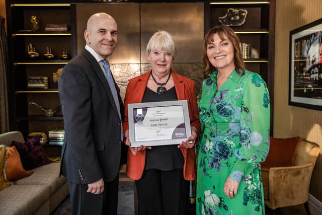 Northern Ireland care professional, Kate Herron was one of only three finalists, selected from 12,000 caregivers nationally, who were in the running for home care company Home Instead’s national ‘Care Professional of the Year’ award.   Pictured is Lorraine Kelly and Martin Jones presenting the award to Kate Herron