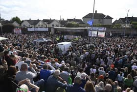 People attend a community event in support of the Garvaghy Road residents in the Drumcree parade dispute on Saturday afternoon