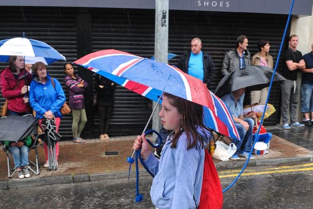 This Union Jack umbrella came in handy during a heavy shower at the Twelfth Demonstration in Dungannon.