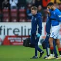 Rangers' Connor Goldson goes off injured during the cinch Premiership match at Fir Park, Motherwell. PIC: Steve Welsh/PA Wire.