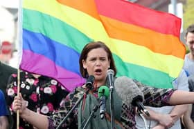Sinn Fein leader Mary Lou McDonald holding a gay pride rainbow flag the day after Lyra McKee was killed in Londonderry; Miss McKee, a gay activist and writer, was shot by accident when dissident republicans opened fire on police during rioting in 2019