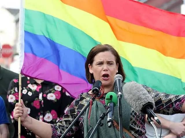 Sinn Fein leader Mary Lou McDonald holding a gay pride rainbow flag the day after Lyra McKee was killed in Londonderry; Miss McKee, a gay activist and writer, was shot by accident when dissident republicans opened fire on police during rioting in 2019