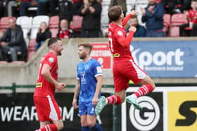 Ben Wilson celebrates netting his third goal in Cliftonville's victory over Dungannon Swifts. PIC: INPHO/Declan Roughan