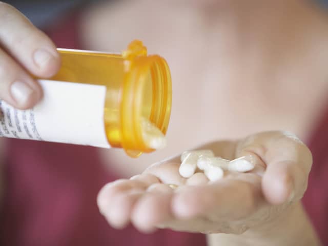 A generic photo of a woman taking her antibiotics. PA Photo/thinkstockphotos