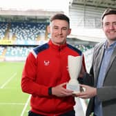 NIFWA Chairman Michael Clarke presents Portadown's Eamon Fyfe with his Championship Player of the Month award