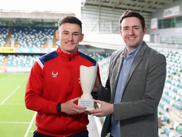 NIFWA Chairman Michael Clarke presents Portadown's Eamon Fyfe with his Championship Player of the Month award