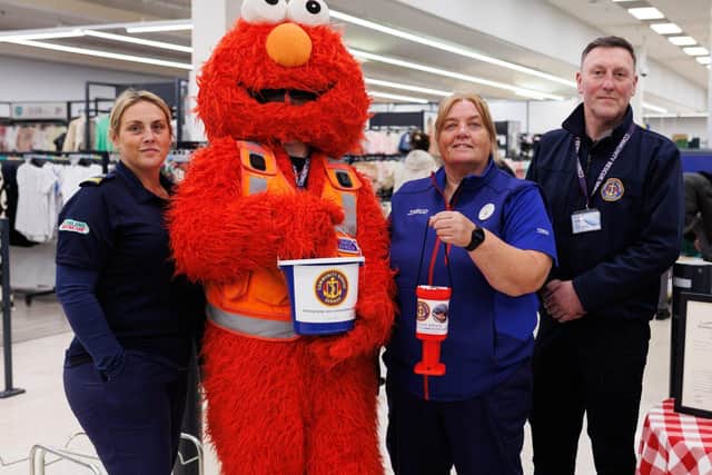 (L-R) Kerry Whitehouse, Elmo, Donna McCotter and Dominic McIlroy, CSR Belfast Unit Commander.