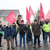 Translink staff on the picket line in Crumlin as 24-hour strike that got under way at midnight is expected to cause extensive disruption across the public transport network on Friday. Pic Colm Lenaghan/Pacemaker