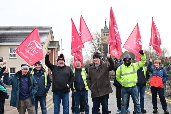 Translink staff on the picket line in Crumlin as 24-hour strike that got under way at midnight is expected to cause extensive disruption across the public transport network on Friday. Pic Colm Lenaghan/Pacemaker