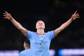 Erling Haaland celebrates setting a Premier League goals record in Manchester City’s victory over West Ham United