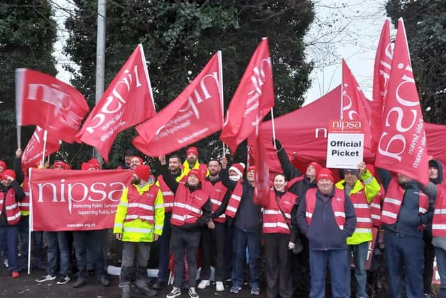 NHS warehouse workers who are members of NIPSA on the first day of their week long strike action over pay and safe staffing, pictured at Boucher Road in Belfast.