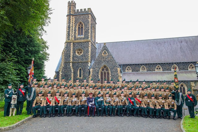 Throngs of spectators have turned out in Ballymena to see the Royal Irish Regiment parade through its streets as part of a military ceremony marking their long connection with the area:-