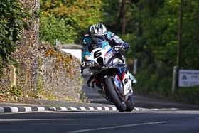 Michael Dunlop on the approach to Gorse Lea on the ROKiT BMW during Superbike qualifying at the Isle of Man TT in June. (Photo by Rod Neill/Pacemaker Press)