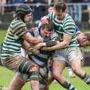 Dungannon's Ben McCaughey tackled at Stevenson Park against Greystones. (Photo by David Maginnis/Pacemaker Press)