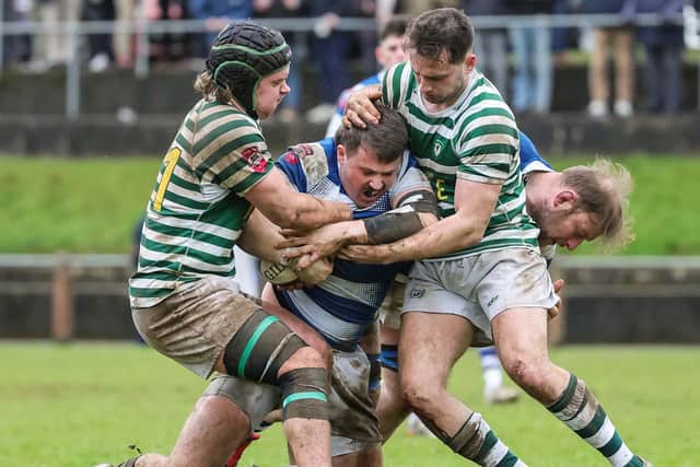 Dungannon's Ben McCaughey tackled at Stevenson Park against Greystones. (Photo by David Maginnis/Pacemaker Press)